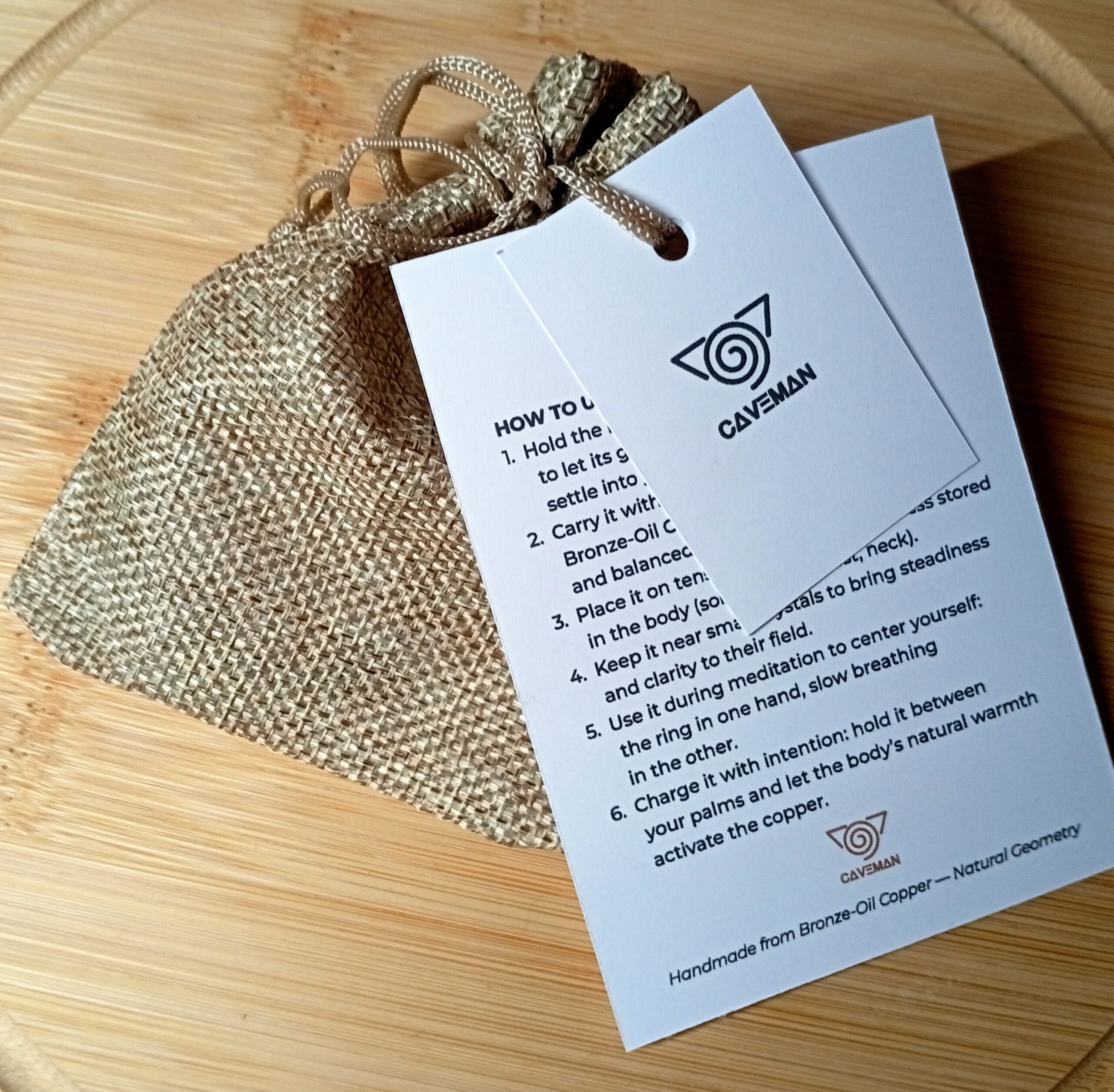 Caveman instruction card and jute bag included with Bronze-Oil tensor ring